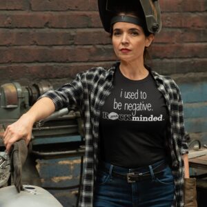 i used be negative-ROCKminded-woman-repairing-her-motorcycle-black-t-shirt-31798 (1500x1500) Women with welding helment in front of motorcycle wearing ROCK Fashion brand t-shirt with statement I used to be negative ROCKminded