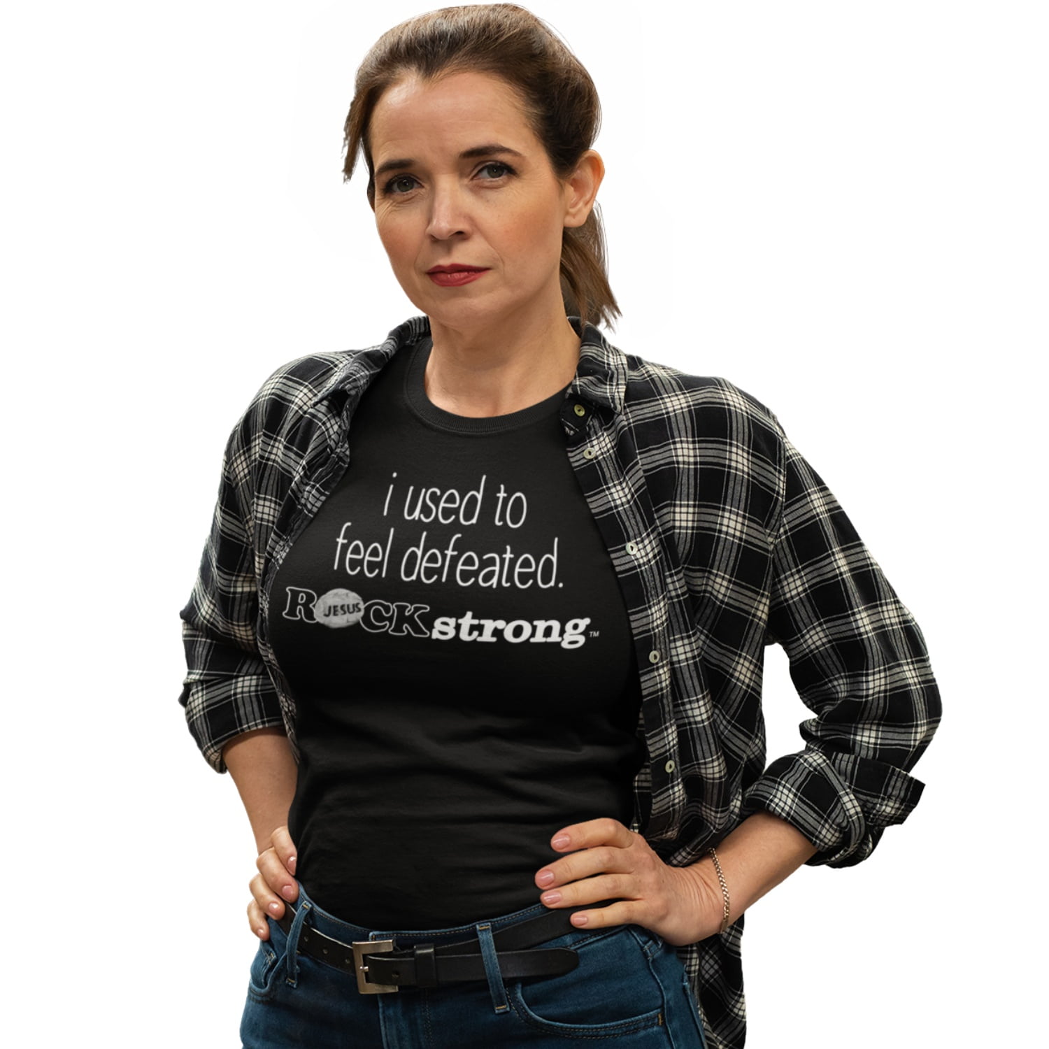 Women standing with hand on hips wearing ROCK Fashion brand t-shirt with statement I used to feel defeated ROCK strong
