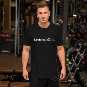 unisex-staple-t-shirt-black-front-65e6b27479194.jpg White guy in front of weight rack at gym wearing a fearless RocktheROCK t-shirt